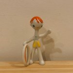 画像:  ハンガリー　　ホロハーザ陶器の人形　 　浮輪を持つ男の子　　A